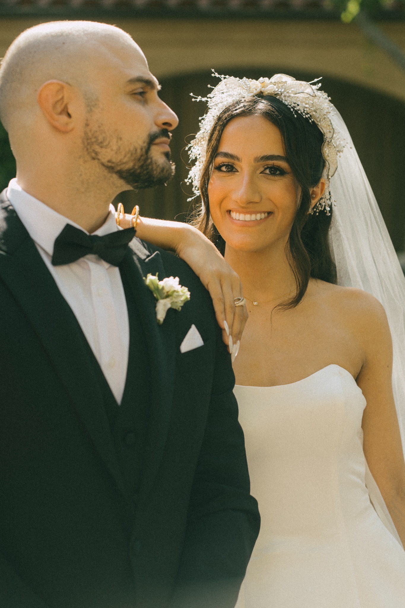 A kiss on the bride’s forehead